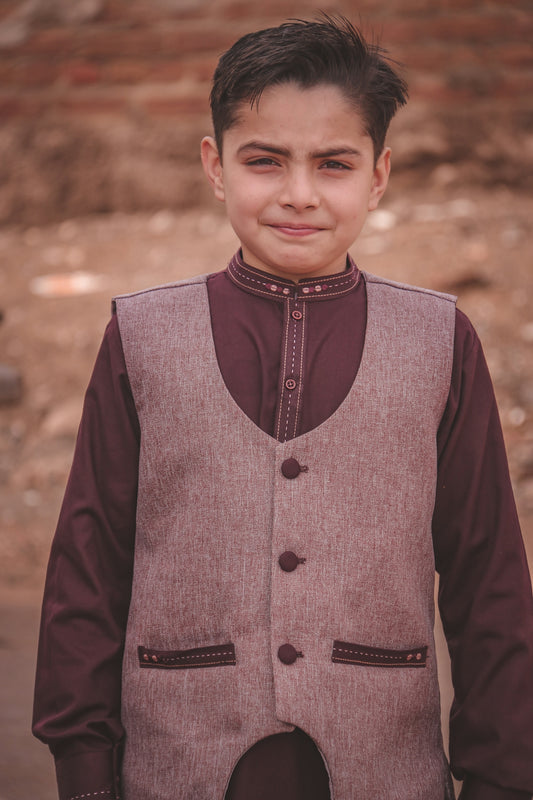 boy in black and gray long sleeve shirt