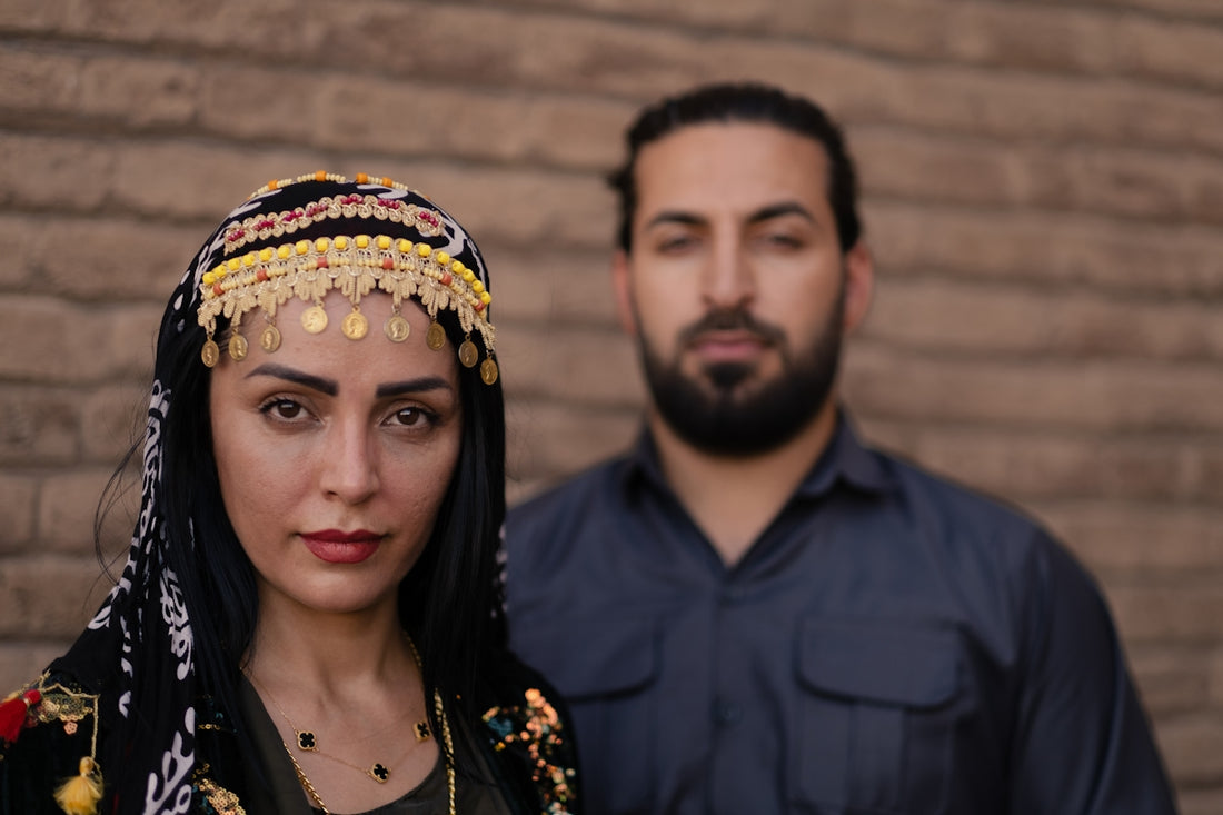 a man and a woman standing next to each other