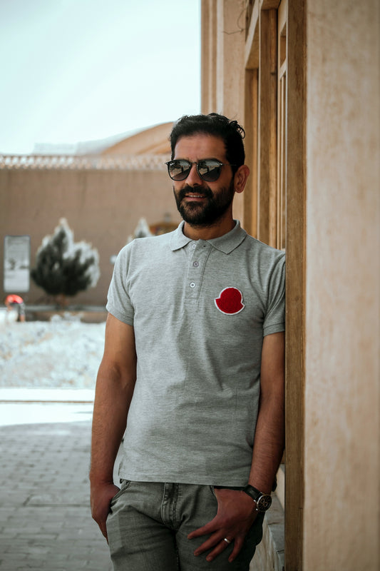 A man standing in front of a building