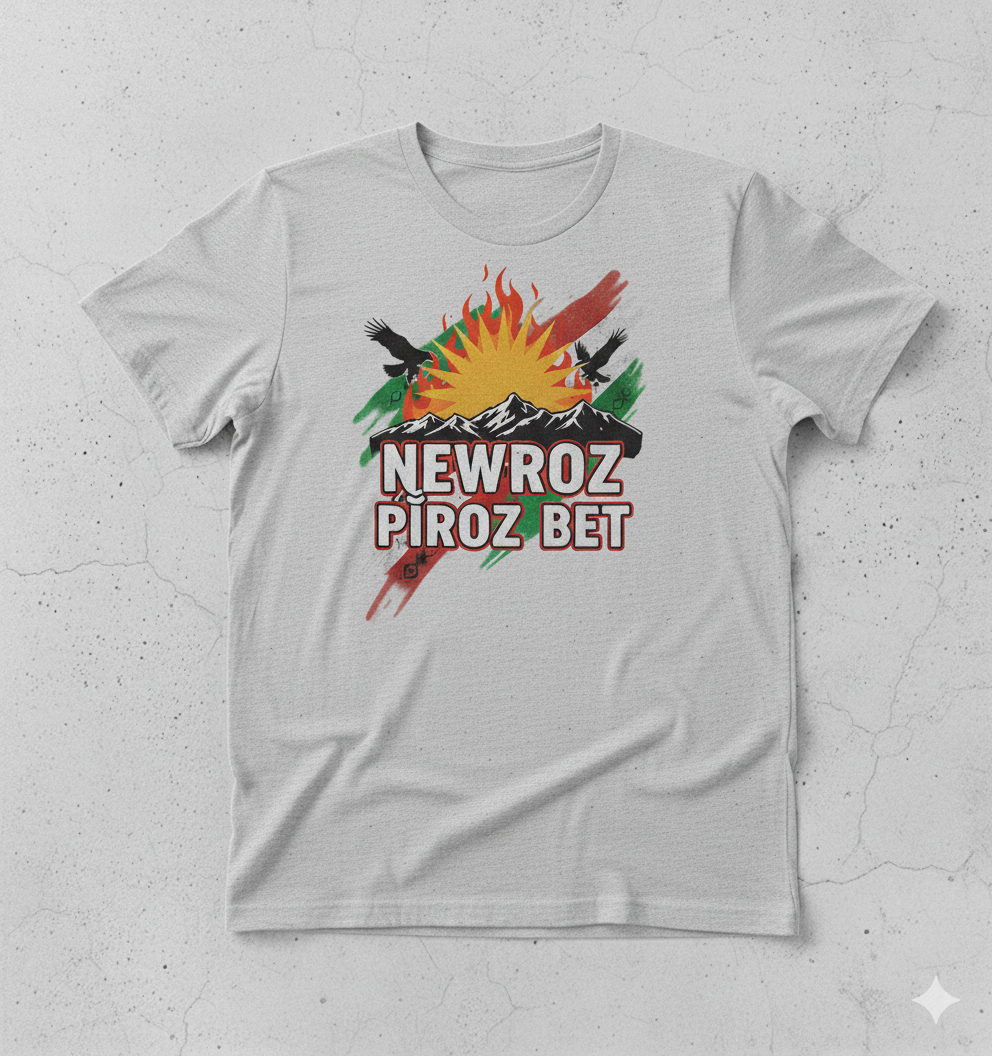 A grey T-Shirt that shows a kurdish design with text saying Newroz Pîroz Bet.