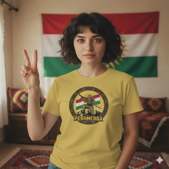 A video of a female model wearing a yellow T-shirt that displays a Kurdish peshmerga design. 